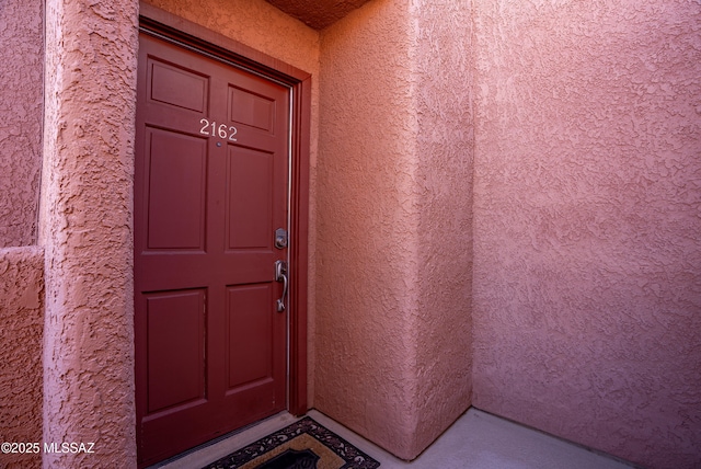 5051 N Sabino Canyon Rd Unit 2162, Tucson, AZ 85750 - doorway to property featuring stucco siding