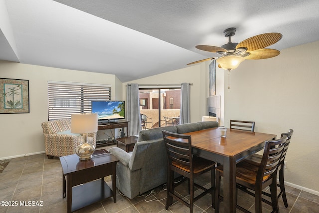 5051 N Sabino Canyon Rd Unit 2162, Tucson, AZ 85750 - dining area featuring baseboards, lofted ceiling, and ceiling fan