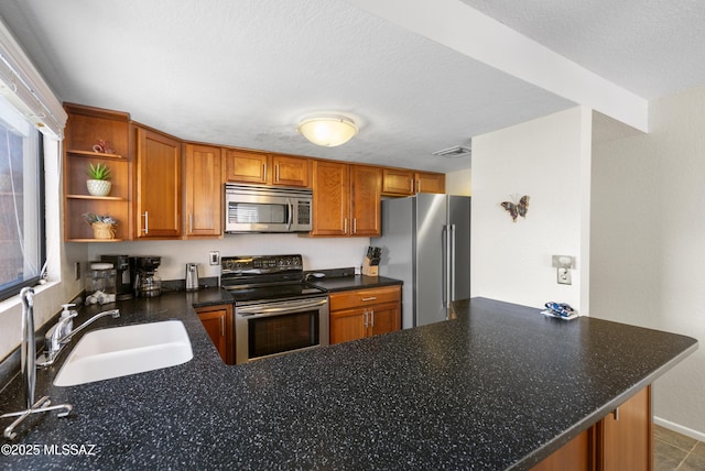 5051 N Sabino Canyon Rd Unit 2162, Tucson, AZ 85750 - kitchen featuring stainless steel appliances, a sink, brown cabinetry, and open shelves