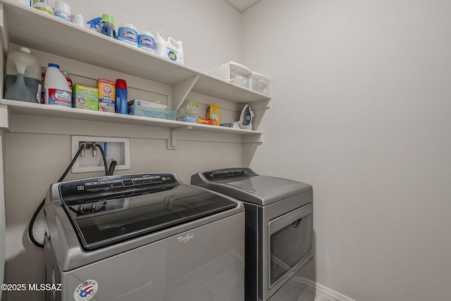 14171 E Adeline Dr, Vail, AZ 85641 - laundry area featuring washer and clothes dryer and baseboards
