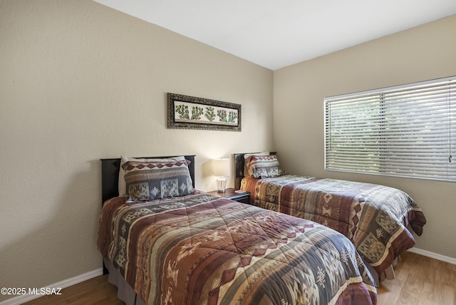5051 N Sabino Canyon Rd Unit 1107, Tucson, AZ 85750 - bedroom featuring wood finished floors and baseboards