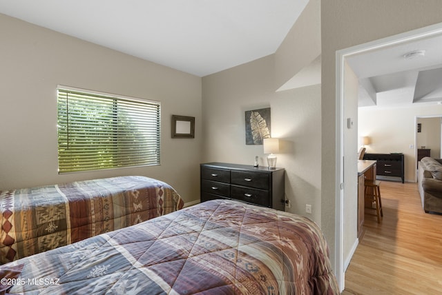 5051 N Sabino Canyon Rd Unit 1107, Tucson, AZ 85750 - bedroom featuring light wood-style floors and baseboards