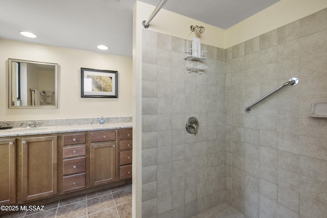 5051 N Sabino Canyon Rd Unit 1107, Tucson, AZ 85750 - bathroom with tiled shower, vanity, and recessed lighting