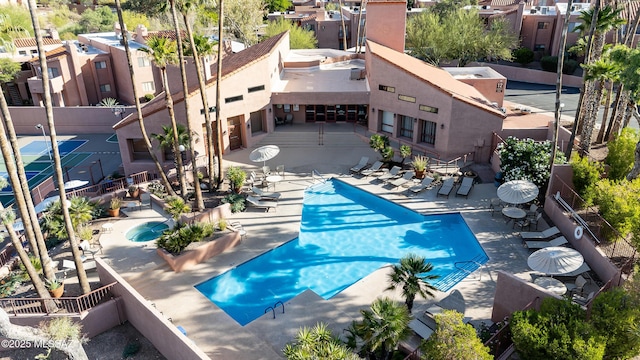 5051 N Sabino Canyon Rd Unit 1107, Tucson, AZ 85750 - community pool featuring a patio