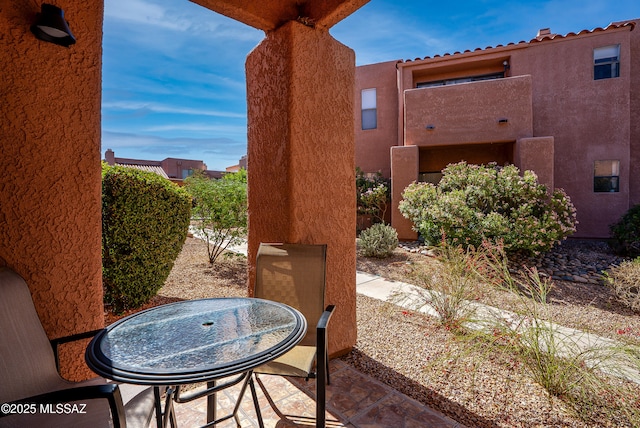 5051 N Sabino Canyon Rd Unit 1107, Tucson, AZ 85750 - view of patio featuring outdoor dining space