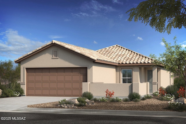 12572 N Krista Ave, Marana, AZ 85653 - view of front of property featuring a tile roof, a garage, stucco siding, and concrete driveway