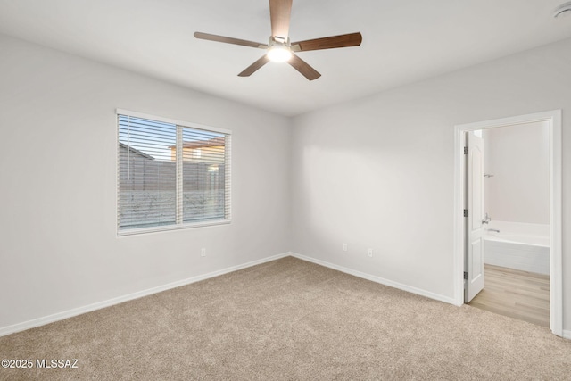 11358 W Folsom Point Dr, Marana, AZ 85658 - carpeted spare room featuring baseboards and ceiling fan