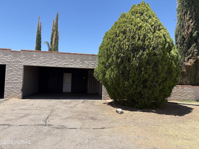 1166 Zircon Ct, Rio Rico, AZ 85648 - view of front of house featuring driveway and a carport