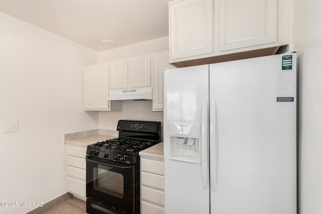 1111 E Lester St, Tucson, AZ 85719 - kitchen with white refrigerator with ice dispenser, black gas stove, under cabinet range hood, decorative backsplash, and light countertops