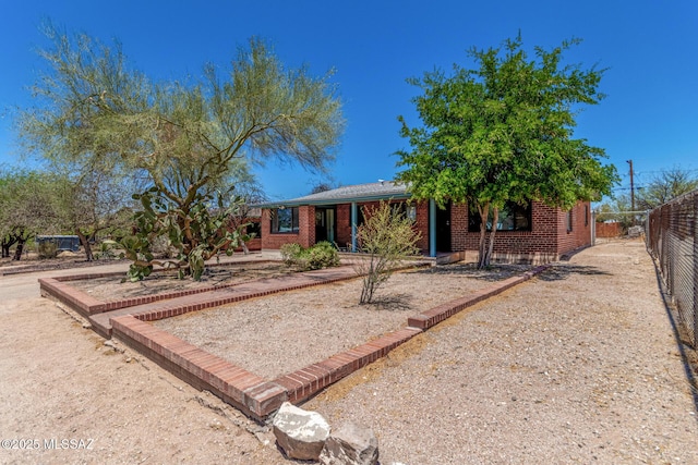 1111 E Lester St, Tucson, AZ 85719 - single story home featuring brick siding