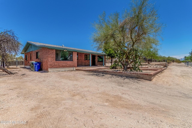 1111 E Lester St, Tucson, AZ 85719 - view of front facade featuring brick siding