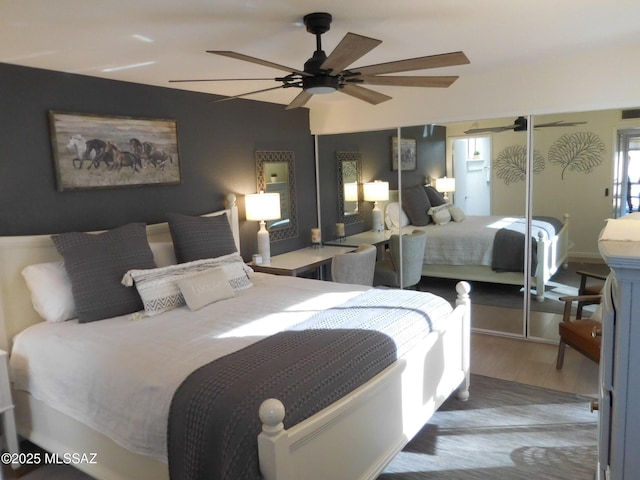 1771 S Desert Vista Dr, Tucson, AZ 85748 - bedroom featuring wood finished floors and a ceiling fan