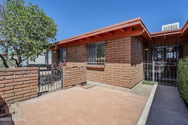 3090 W Alaska St, Tucson, AZ 85746 - view of patio / terrace featuring a gate