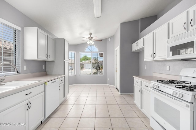 2649 W Catalina View Dr, Tucson, AZ 85742 - kitchen with white appliances, light countertops, a sink, white cabinets, and a ceiling fan