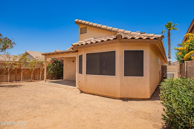 2649 W Catalina View Dr, Tucson, AZ 85742 - rear view of house with stucco siding, a tile roof, and a patio area