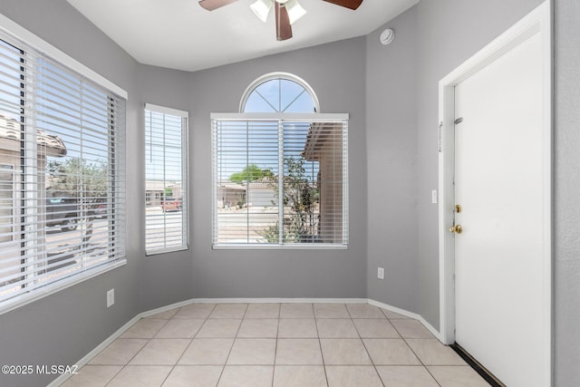 2649 W Catalina View Dr, Tucson, AZ 85742 - spare room featuring a ceiling fan, light tile patterned floors, a smoke detector, and baseboards