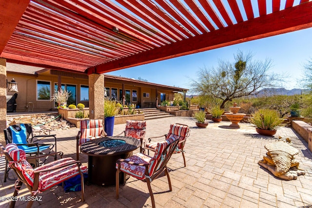 3740 W Placita Fantasia, Tucson, AZ 85745 - view of patio / terrace with a fire pit
