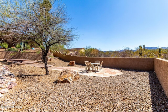 3740 W Placita Fantasia, Tucson, AZ 85745 - fenced backyard featuring a patio area and a mountain view