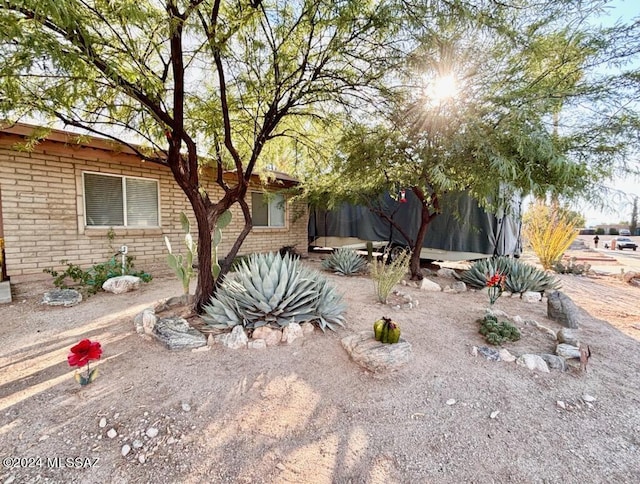 9756 E 32nd St, Tucson, AZ 85748 - view of front of home featuring brick siding