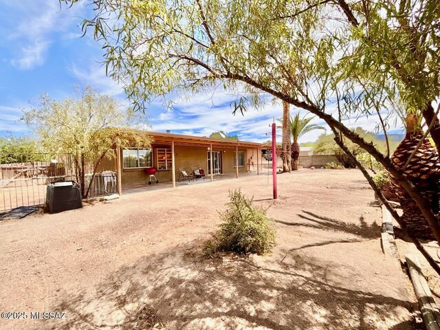 9756 E 32nd St, Tucson, AZ 85748 - view of front facade with a patio area