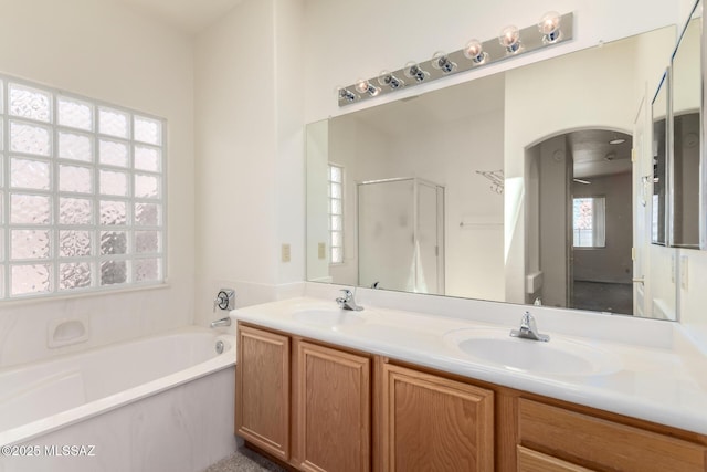 3252 W Flowering Cactus Ct, Tucson, AZ 85745 - full bath with a garden tub, a shower stall, and double vanity