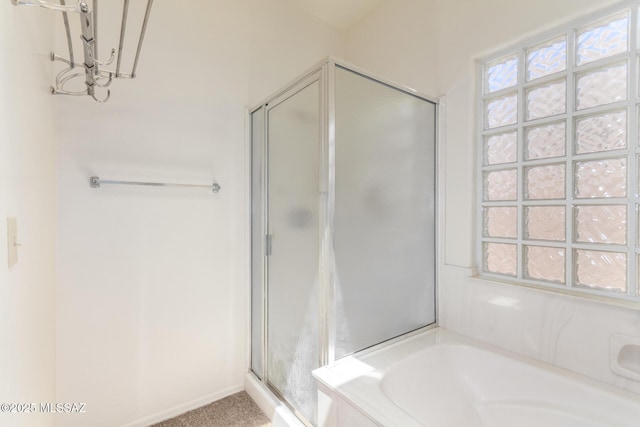 3252 W Flowering Cactus Ct, Tucson, AZ 85745 - bathroom featuring a shower stall, a bath, and a chandelier