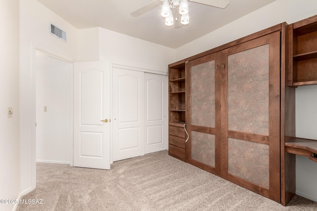 3252 W Flowering Cactus Ct, Tucson, AZ 85745 - unfurnished bedroom with carpet, a ceiling fan, and a closet