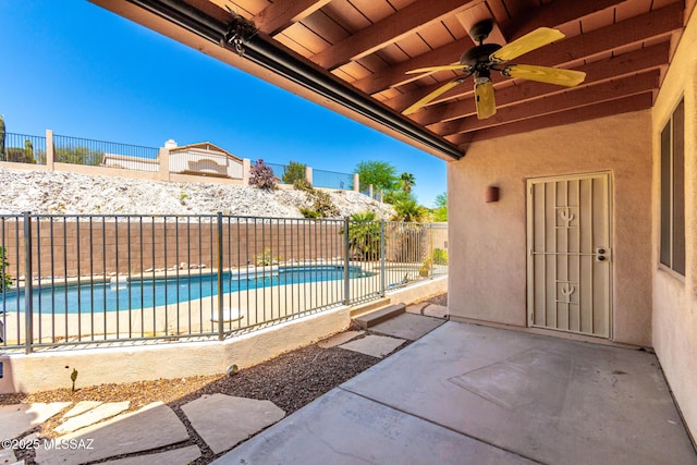 3252 W Flowering Cactus Ct, Tucson, AZ 85745 - fenced backyard with ceiling fan and a patio