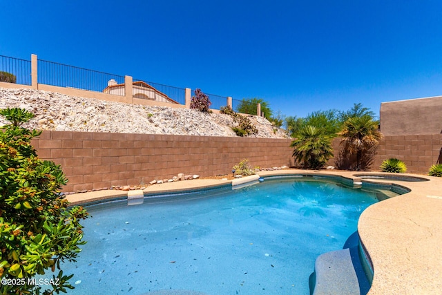 3252 W Flowering Cactus Ct, Tucson, AZ 85745 - view of pool featuring a fenced backyard and a pool with connected hot tub