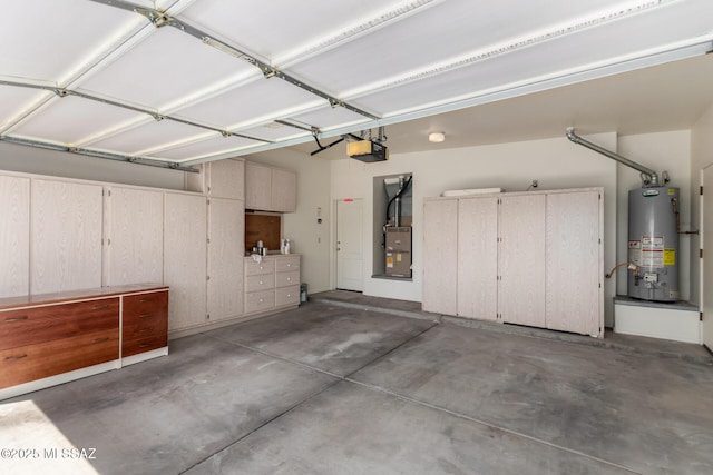 3252 W Flowering Cactus Ct, Tucson, AZ 85745 - garage featuring gas water heater, heating unit, and a garage door opener