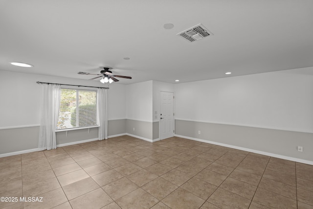6945 S Wingbow Dr, Tucson, AZ 85756 - unfurnished room featuring light tile patterned floors, a ceiling fan, recessed lighting, and baseboards