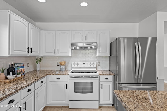 6945 S Wingbow Dr, Tucson, AZ 85756 - kitchen with white range with electric cooktop, ventilation hood, freestanding refrigerator, light stone countertops, and recessed lighting