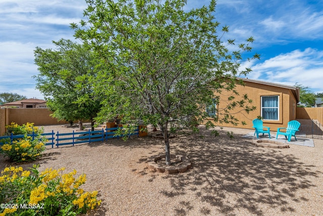 6945 S Wingbow Dr, Tucson, AZ 85756 - fenced backyard featuring a patio area