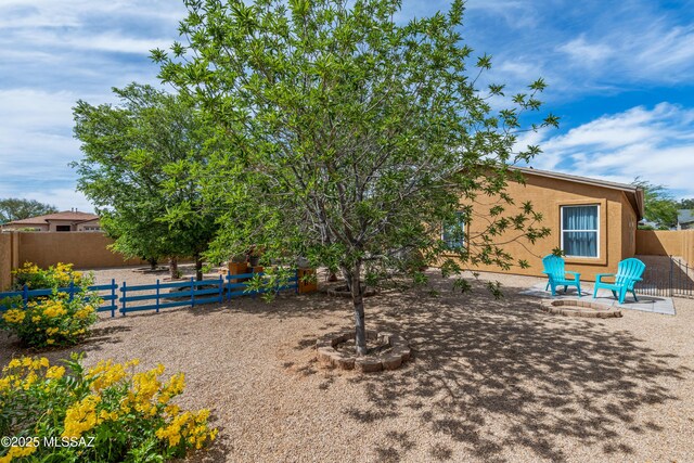 6945 S Wingbow Dr, Tucson, AZ 85756 - fenced backyard with a patio area