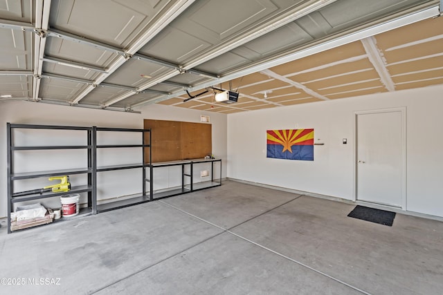 6945 S Wingbow Dr, Tucson, AZ 85756 - garage featuring a garage door opener