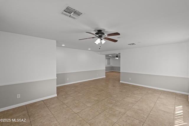 6945 S Wingbow Dr, Tucson, AZ 85756 - empty room with a ceiling fan, light tile patterned floors, recessed lighting, and baseboards