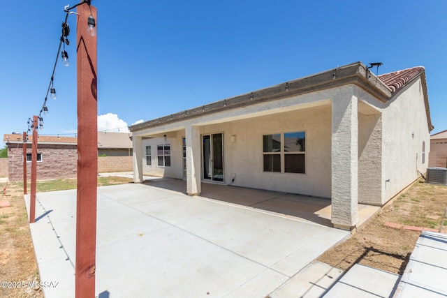 854 S Willis Ave, Vail, AZ 85641 - rear view of property with stucco siding, a patio area, and central AC