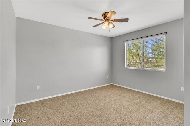 7441 E Sycamore Park Blvd, Tucson, AZ 85756 - empty room with a ceiling fan and carpet