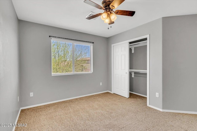 7441 E Sycamore Park Blvd, Tucson, AZ 85756 - unfurnished bedroom featuring carpet, a closet, and a ceiling fan