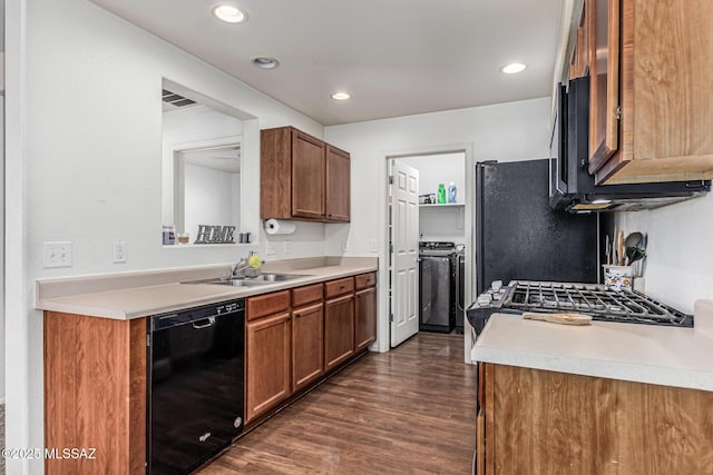 6399 S Sunrise Valley Dr, Tucson, AZ 85706 - kitchen featuring black appliances, a sink, dark wood-type flooring, light countertops, and recessed lighting