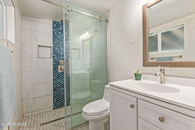 5809 E Rosewood St, Tucson, AZ 85711 - full bath featuring a shower stall, vanity, and toilet
