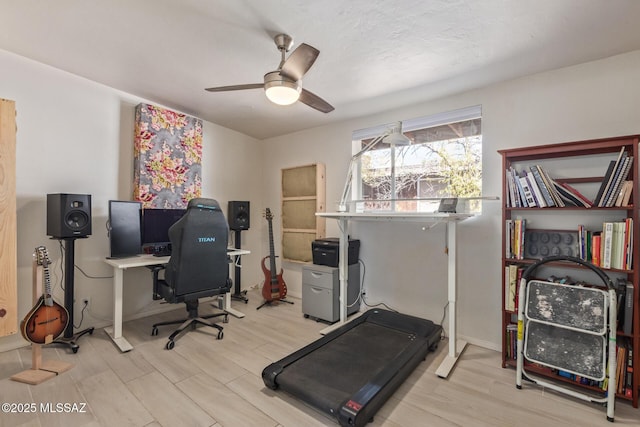 5809 E Rosewood St, Tucson, AZ 85711 - office featuring wood finished floors, ceiling fan, and baseboards