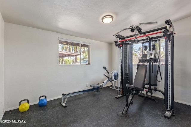 5809 E Rosewood St, Tucson, AZ 85711 - exercise area with baseboards
