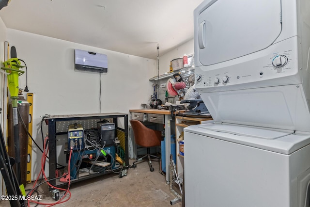5809 E Rosewood St, Tucson, AZ 85711 - laundry room with estacked washer and dryer and a wall mounted air conditioner