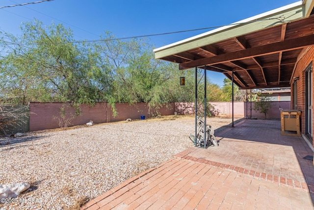5809 E Rosewood St, Tucson, AZ 85711 - deck featuring a fenced backyard and a patio area