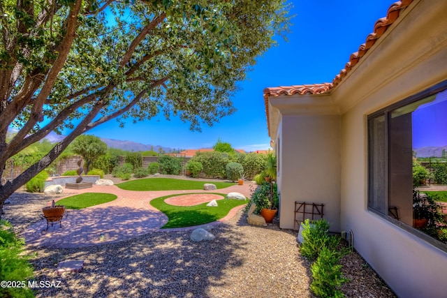 7275 E Vuelta Rancho Mesquite, Tucson, AZ 85715 - fenced backyard featuring a patio and a mountain view