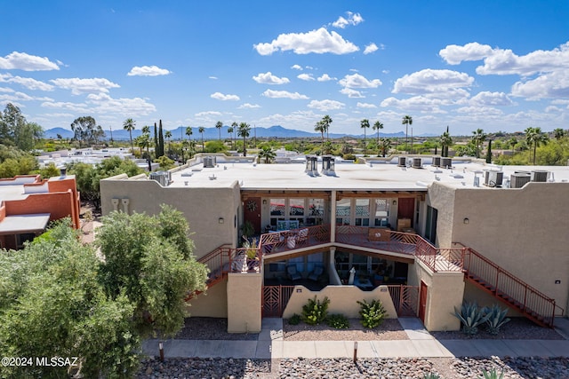 6255 N Camino Pimeria Alta Unit 22, Tucson, AZ 85718 - view of property with stairway and a mountain view