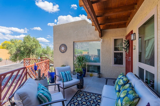 6255 N Camino Pimeria Alta Unit 22, Tucson, AZ 85718 - view of patio with a balcony and an outdoor hangout area