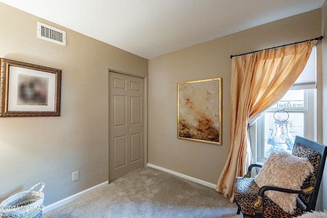 6255 N Camino Pimeria Alta Unit 22, Tucson, AZ 85718 - sitting room featuring carpet and baseboards