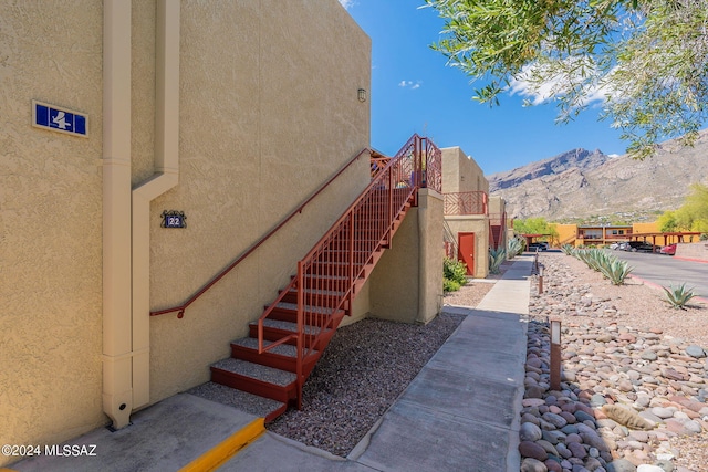 6255 N Camino Pimeria Alta Unit 22, Tucson, AZ 85718 - stairs with a mountain view